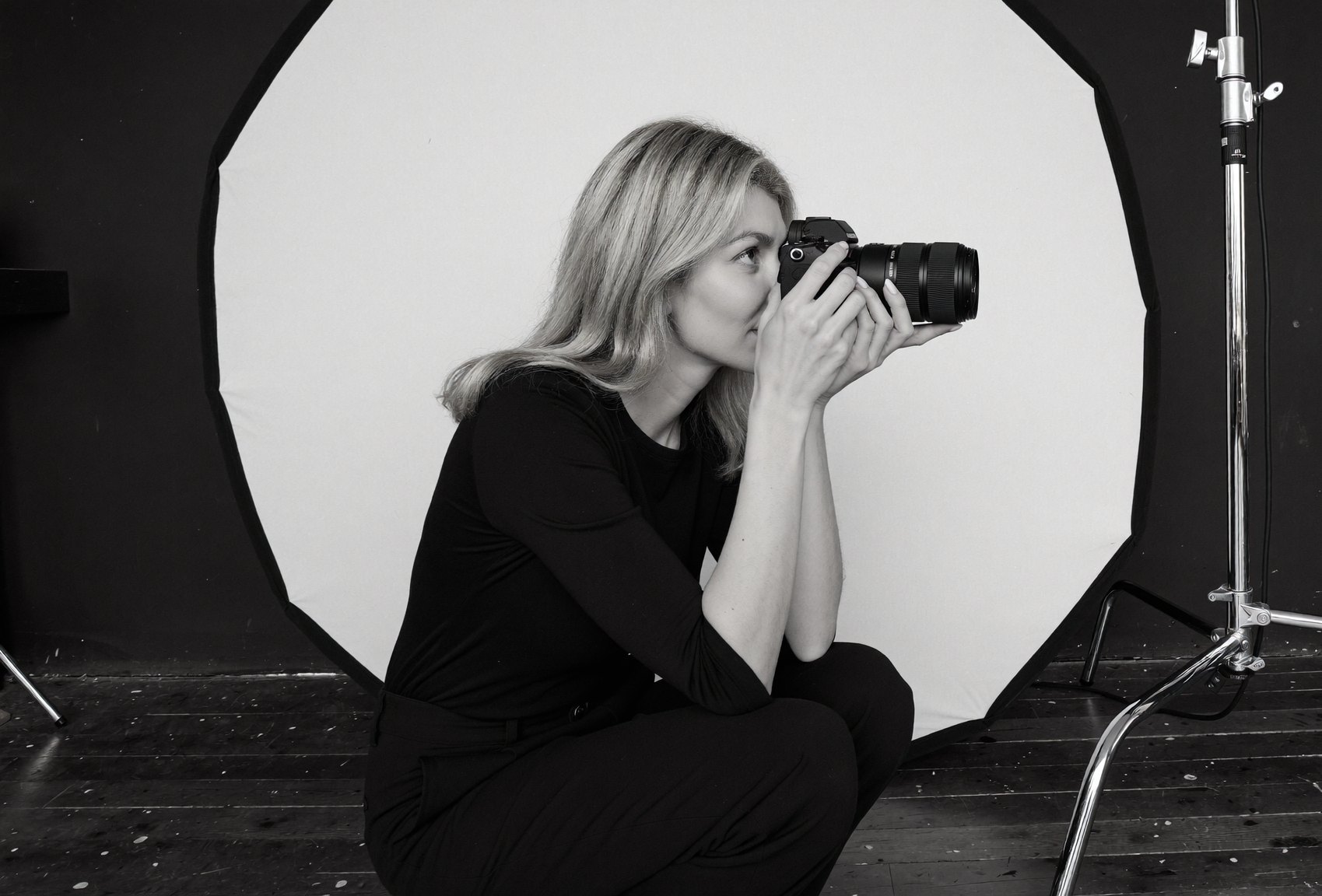 Marina Ziva photographing in her studio with a Sony camera