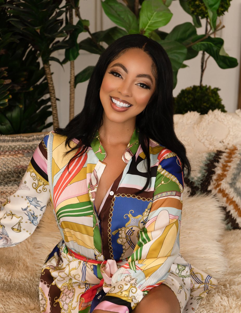 Personal branding portrait, smiling woman in a printed silk dress